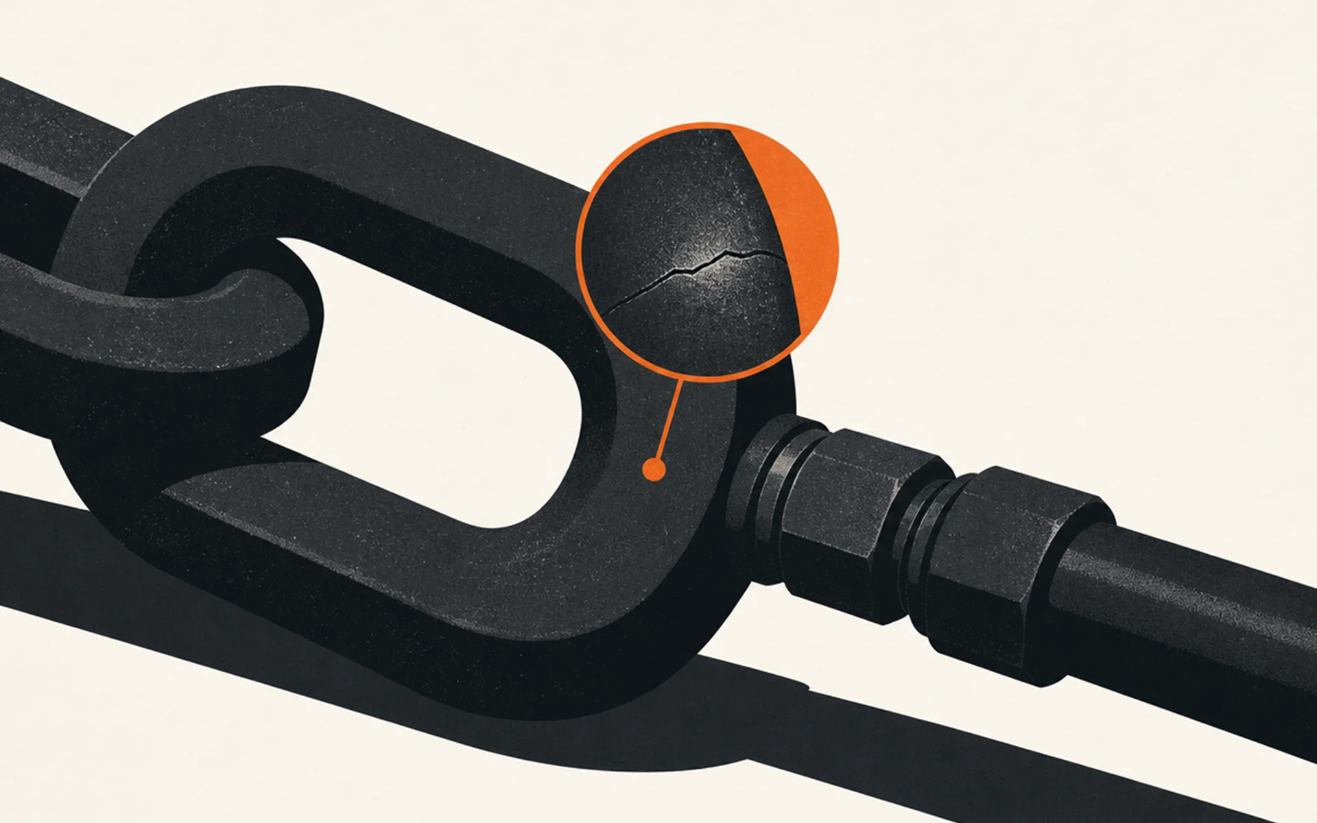 A close-up of a heavy black metal chain link in, featuring an orange magnified inset that highlights a hairline crack i
