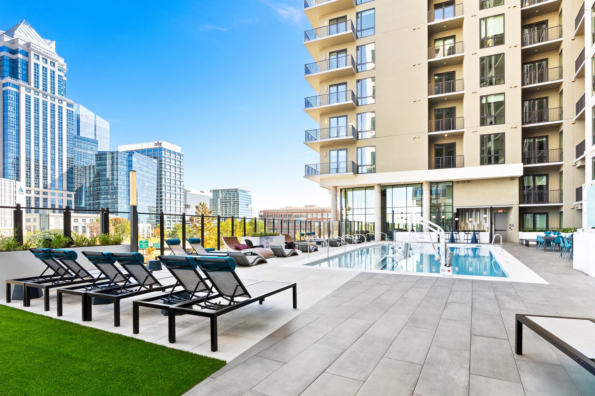 Bond on Mint rooftop pool deck with window wall above
