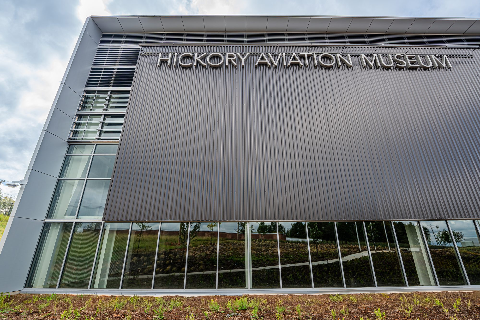 Hickory Aviation Museum signage elevation with storefront glazing