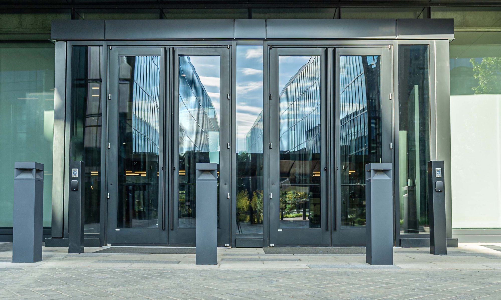 Storefront entry with bollards at the Centene campus