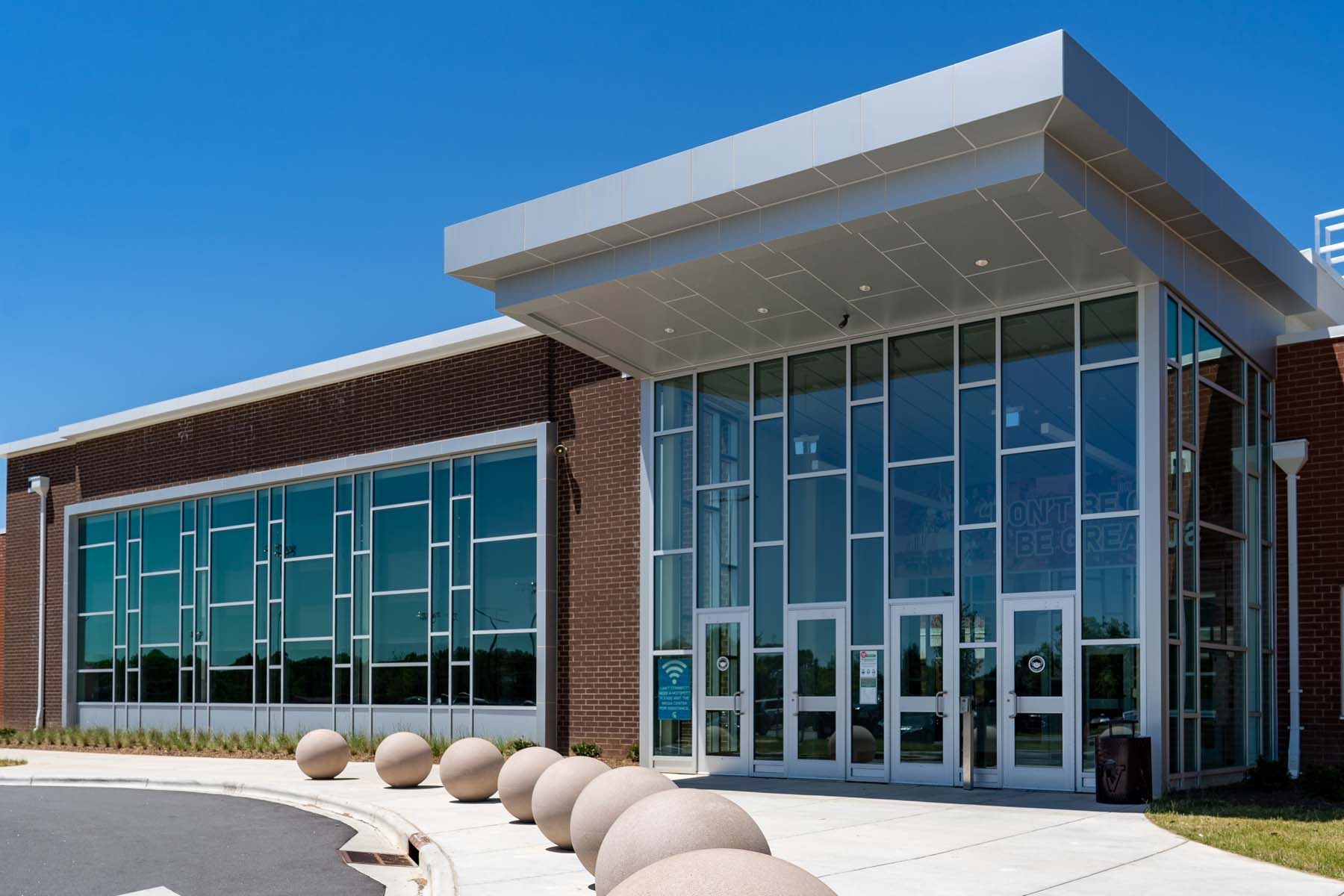 Front elevation with storefront ribbons at Sun Valley High School