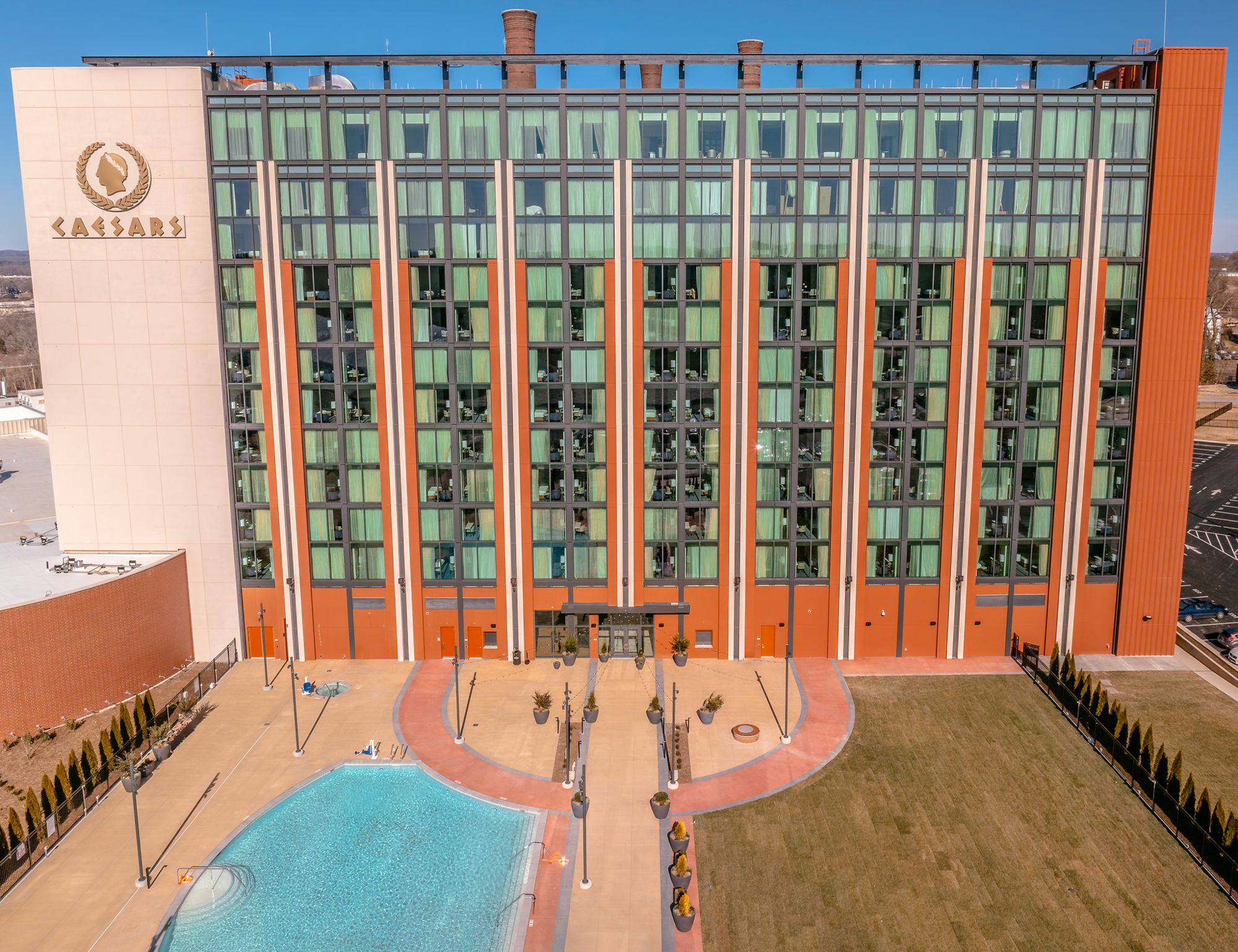 Aerial view of the Caesars Virginia hotel tower front elevation and pool