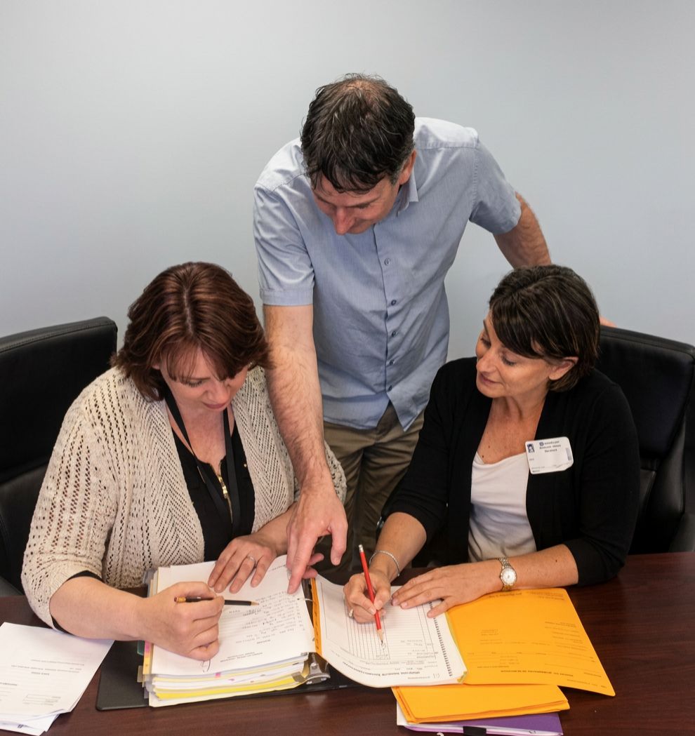 Coach working with teachers.