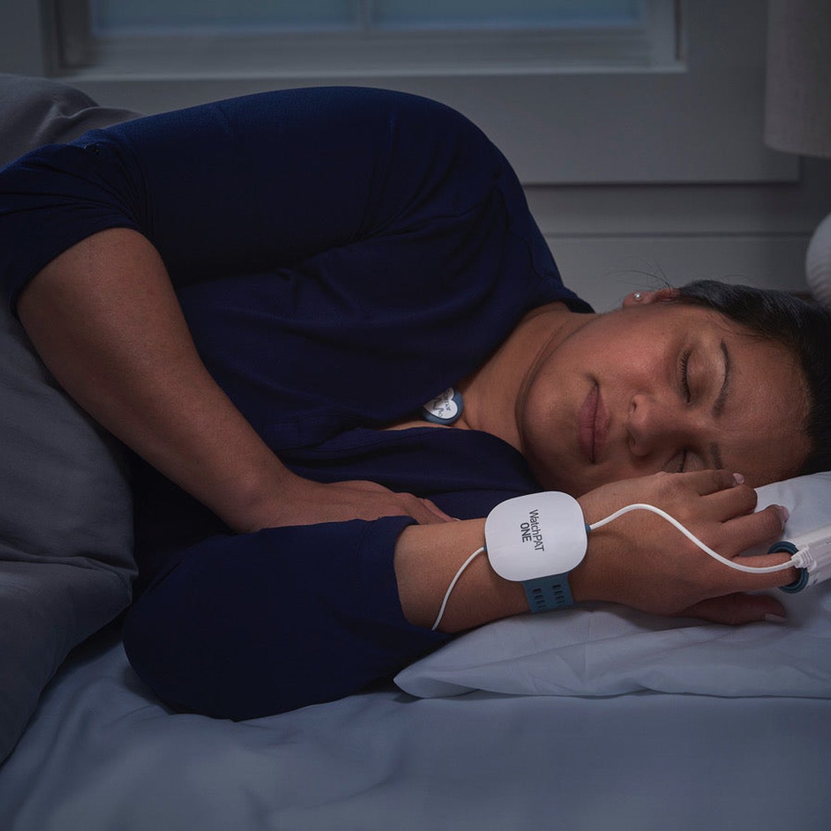 Woman completing the sleep test at home