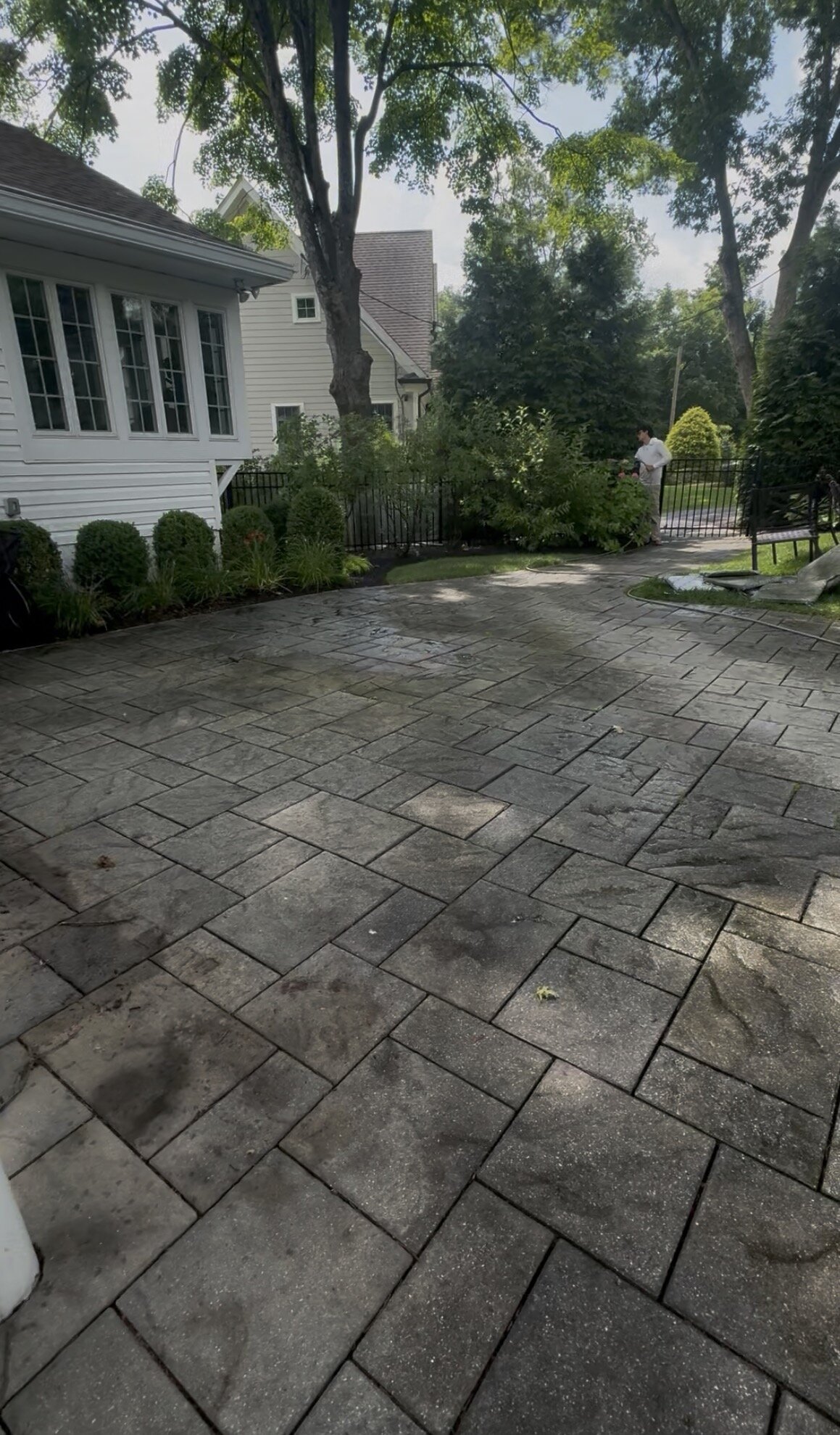 Clean stamped concrete driveway after pressure washing