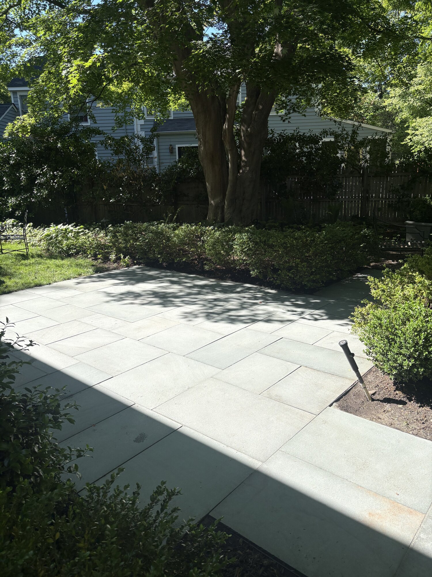 Clean bluestone patio after professional pressure washing