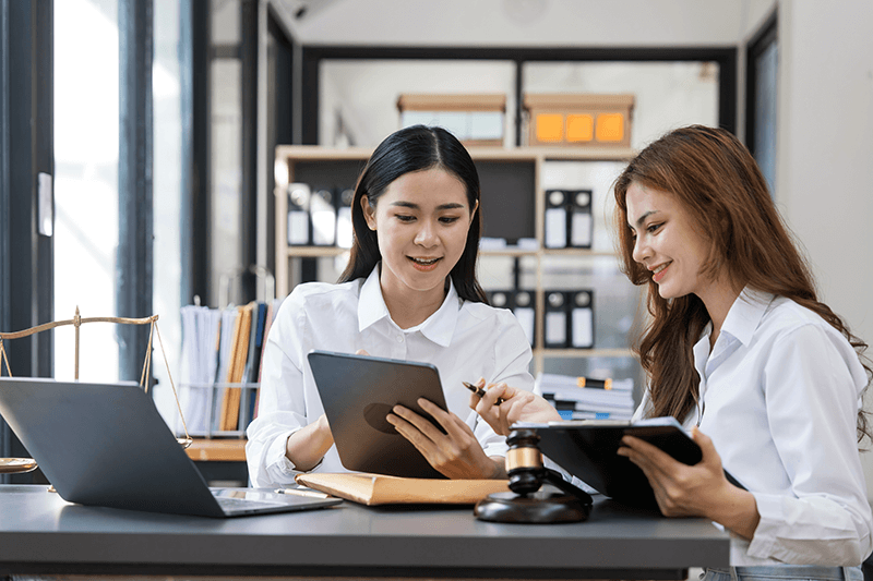 Attorneys review documents on iPad