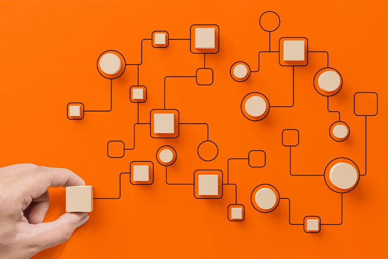 orange background with wooden blocks representing workflows