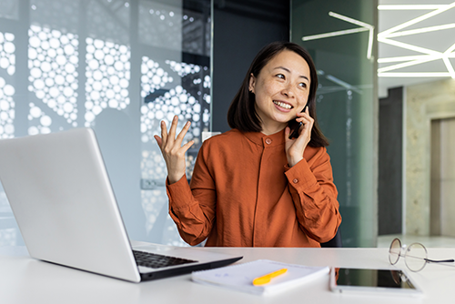 Woman makes a phone call to a prospect