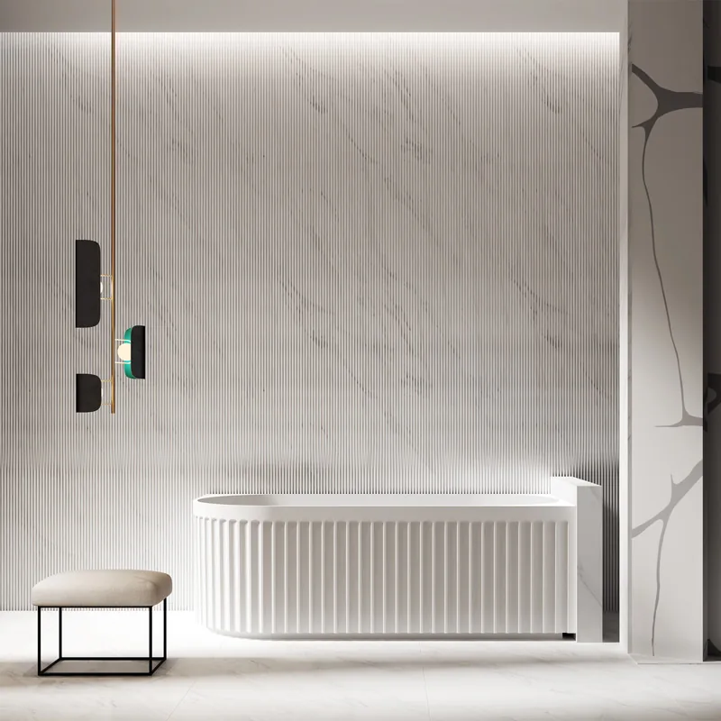 Fluted white back to wall bath against ribbed stone look wall panelling.