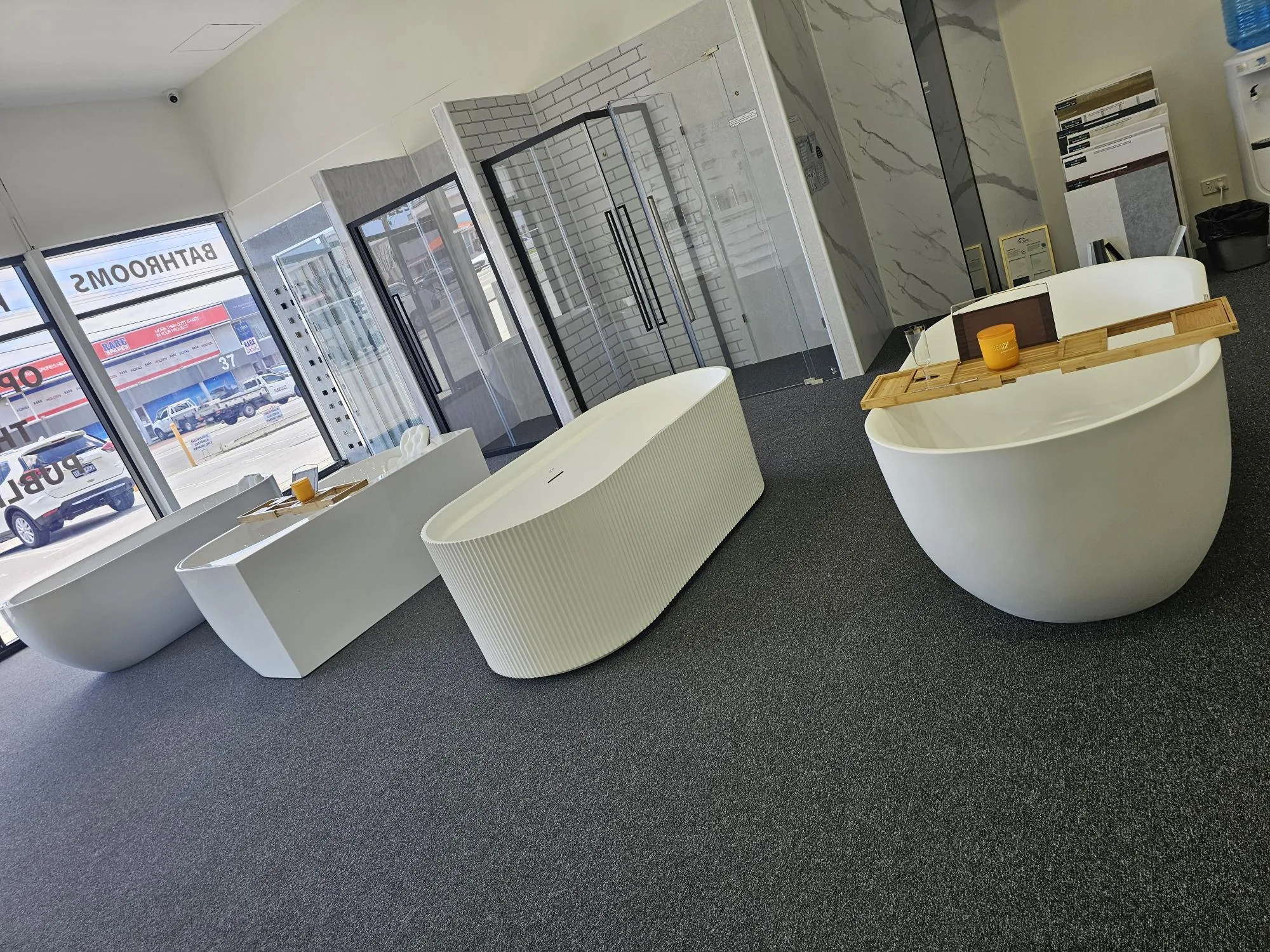 Freestanding baths on display on the showroom floor