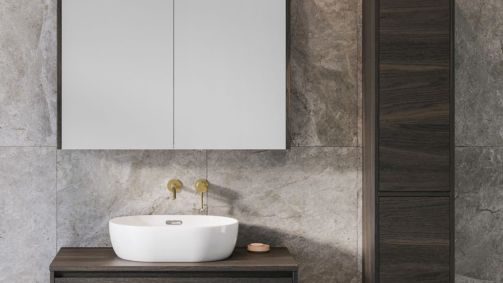 Timberline Hudson tallboy in dark timber beside a wall hung vanity and mirrored shaving cabinet