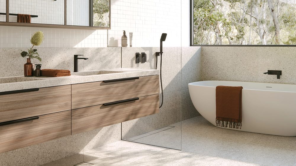Phoenix Teel squareline tapware in a bathroom with a timber vanity and freestanding bath