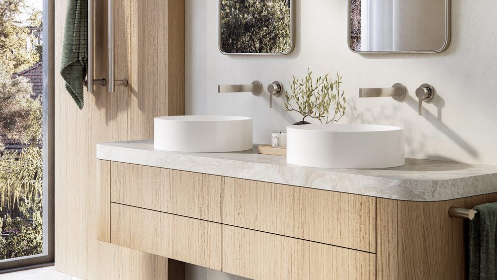 Phoenix Lexi MKII wall mixers above twin basins on a timber vanity
