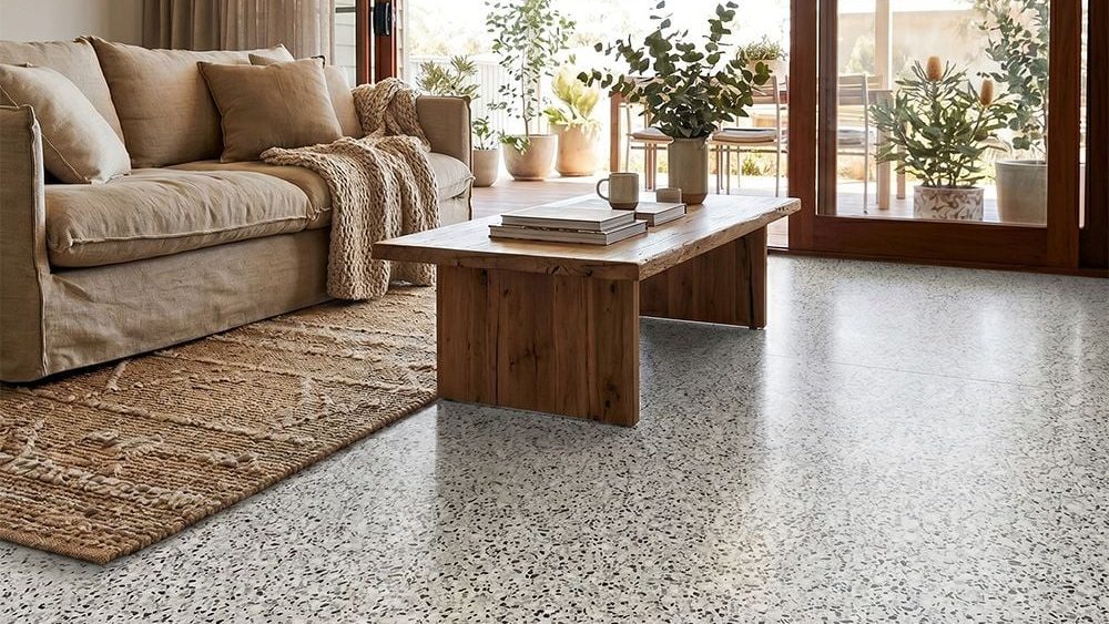 Alpine SPC hybrid flooring in a terrazzo look through an open plan living room