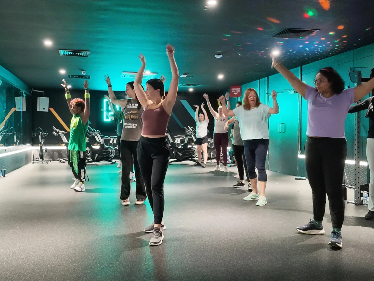 Ashiklal Pyarilal leading a group Zumba fitness session