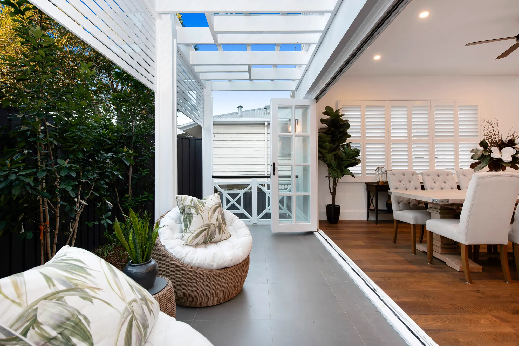 Indoor and outdoor living area of a custom home built by Heuser Homes in Brisbane.