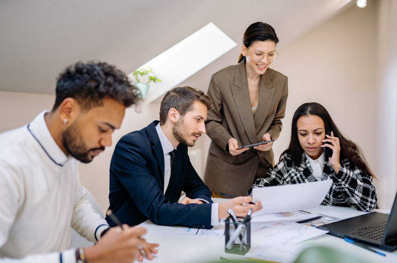 A multidisciplinary digital squad collaborating on modern data infrastructure projects for public sector data recruitment.