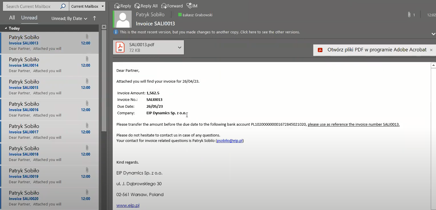 Screenshot of Outlook inbox showing an email with attached PDF invoice sent from Business Central.