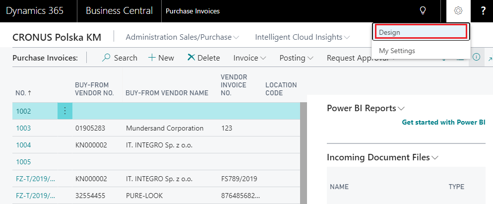 Screenshot of Business Central showing the Purchase Invoices page with the "Design" option selected from the settings menu.