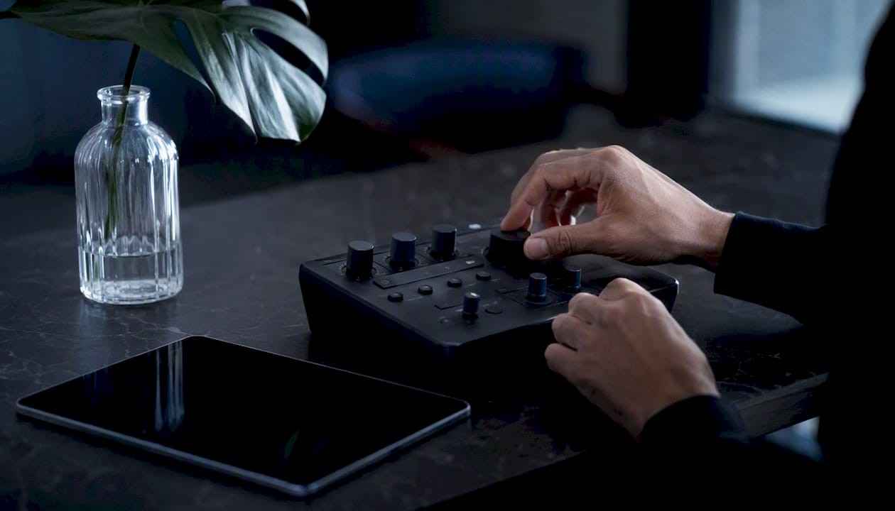 Hands adjusting audience targeting controls