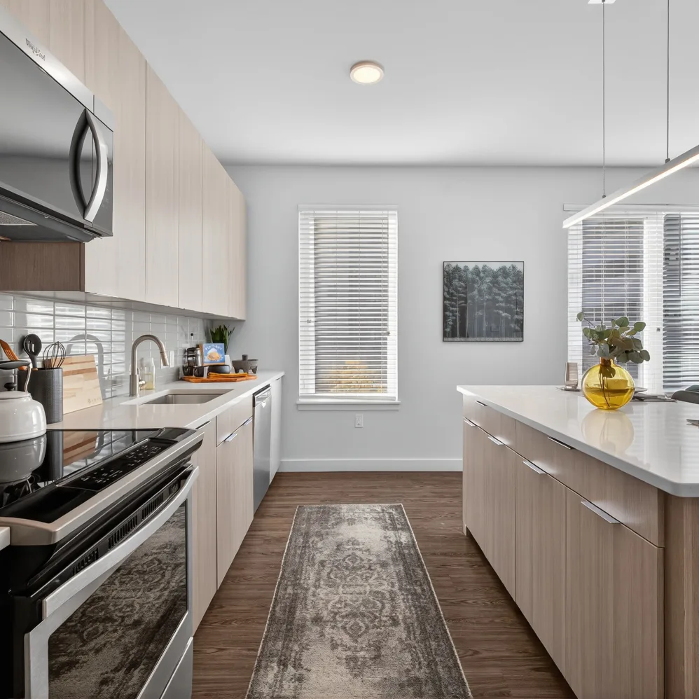 Kitchen with light wood cabinets