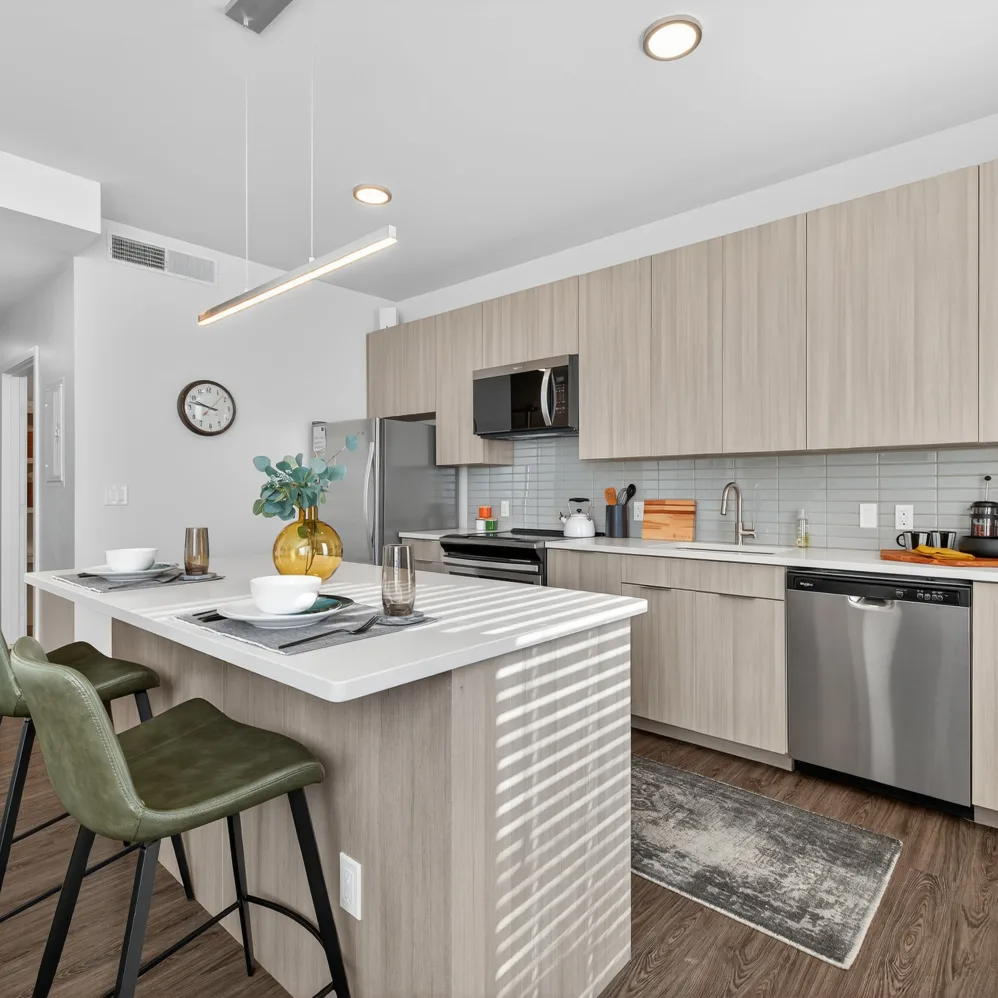 Kitchen with light wood cabinets 