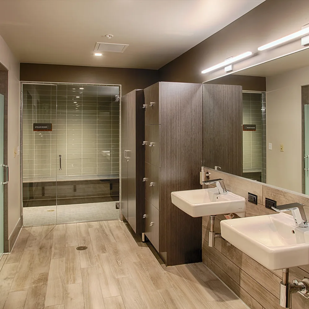 Bathroom area with showers