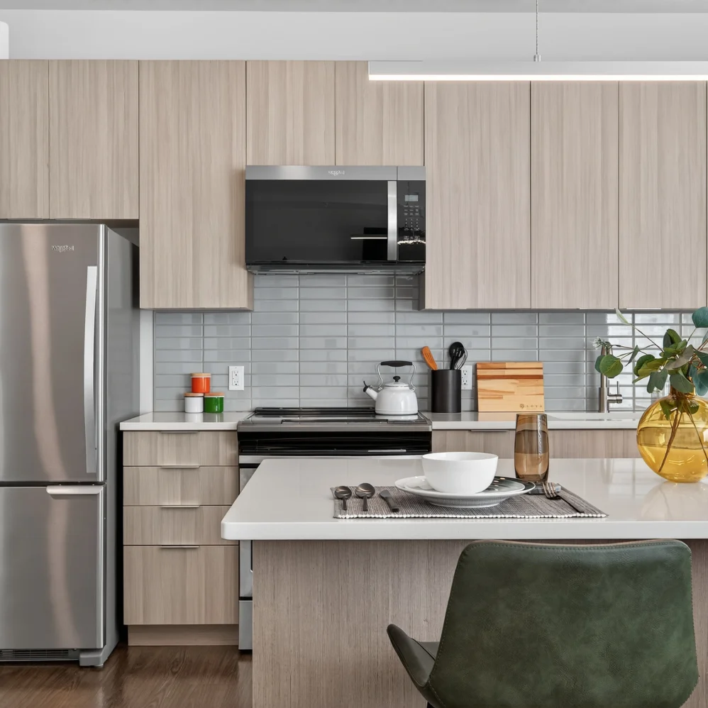 Kitchen with light wood cabinets