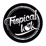 Circular black logo with white brushstroke border and stylized white text reading 'Tropical kok'.