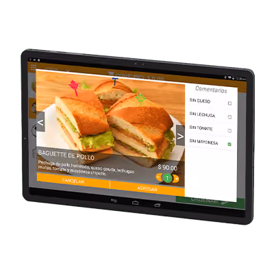 Tablet screen showing a food ordering app with a chicken sandwich named 'Baguette de Pollo' priced at $90.00, with options to customize toppings like cheese, lettuce, tomato, and mayonnaise, alongside buttons to cancel or add the item.