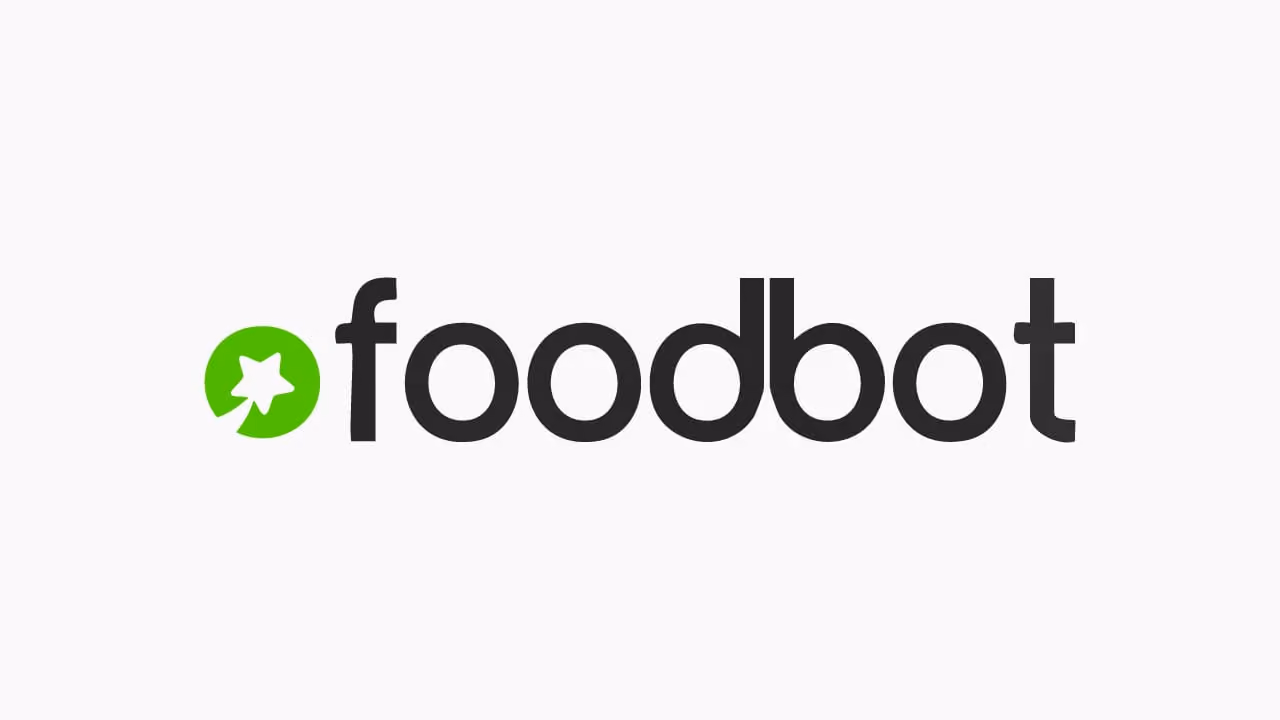Foodbot logo with black lowercase text and a green circle containing a white star shape to the left.