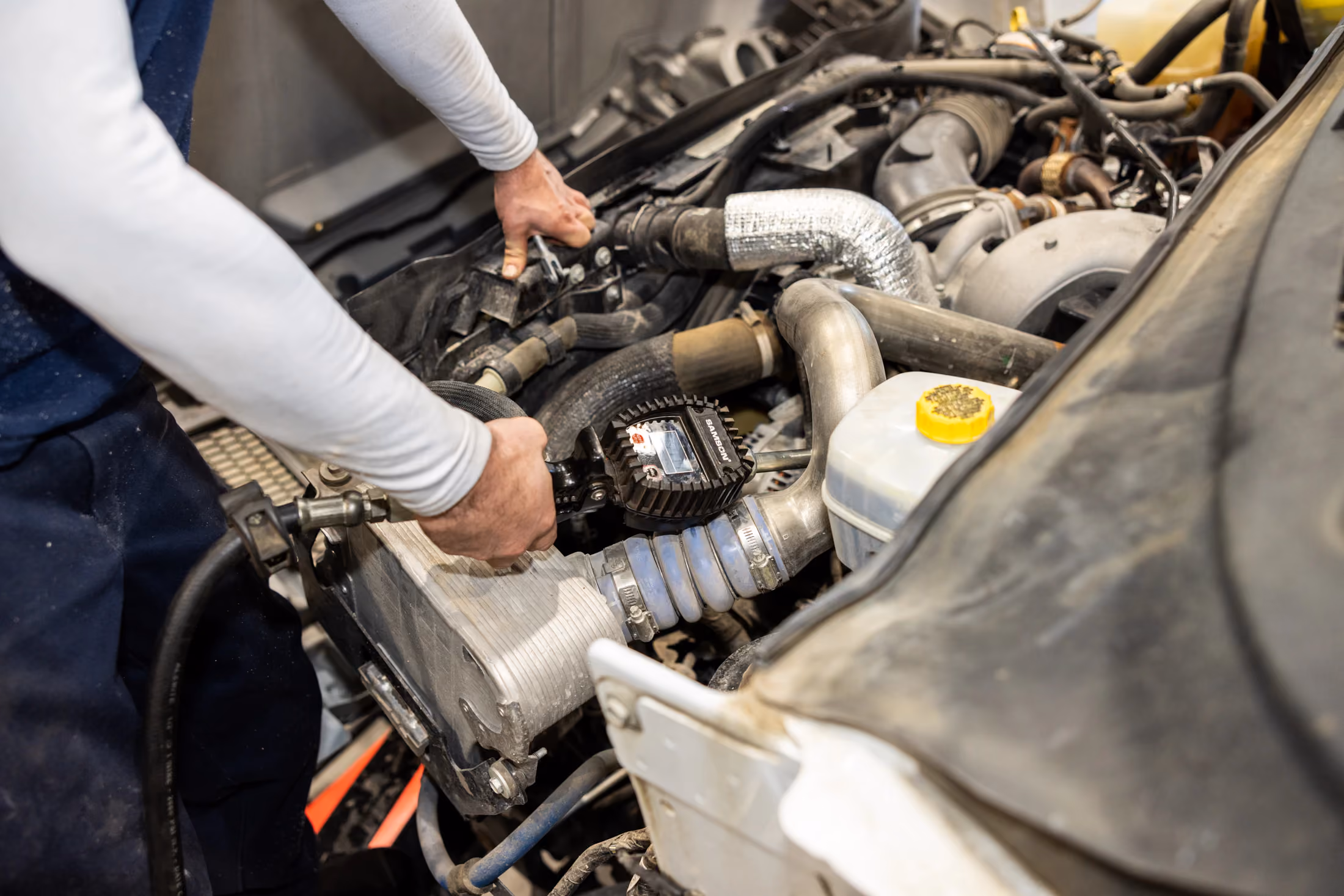 Mechanic performing preventive maintenance