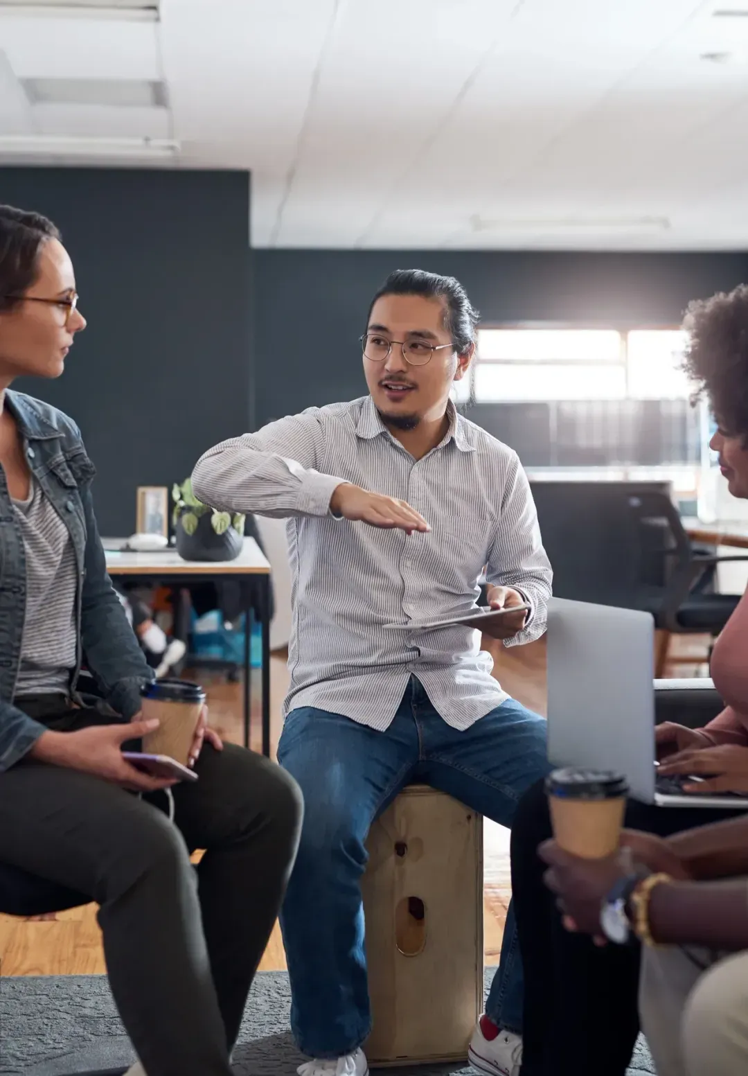 A sales team reviewing competitive research together