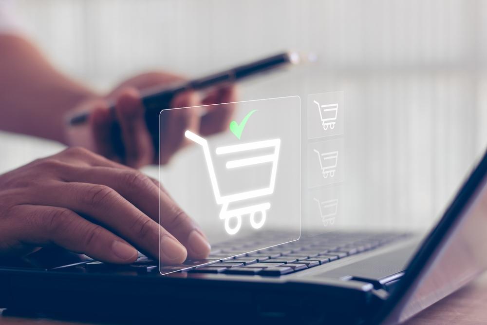 Someone online shopping on a laptop