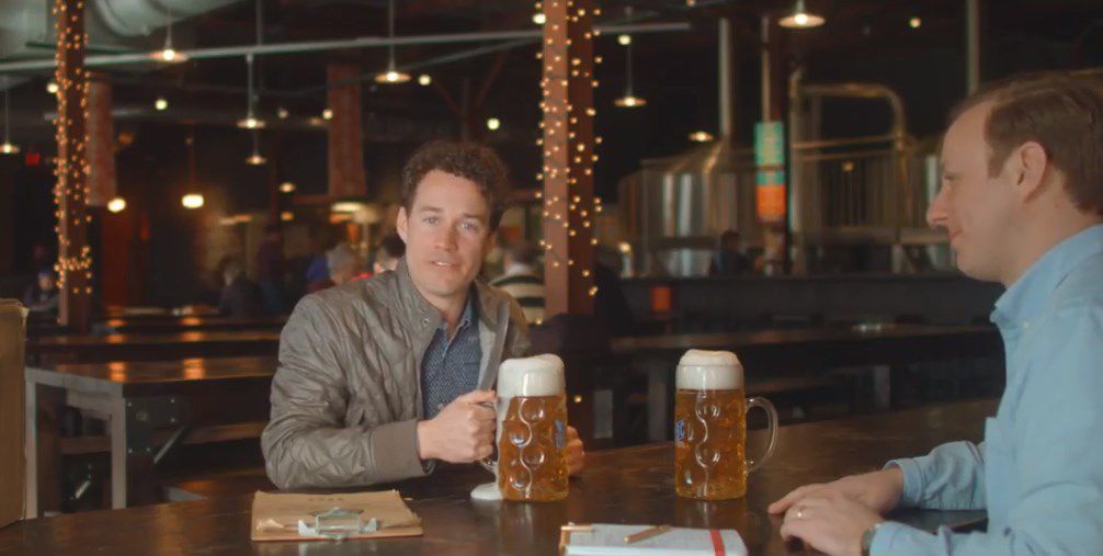 SwipeSum founders Michael and Steven Seaman share beers at Urban Chestnut Brewing Co. The scene is from a video the brothers produced to introduce their company to St. Louis.