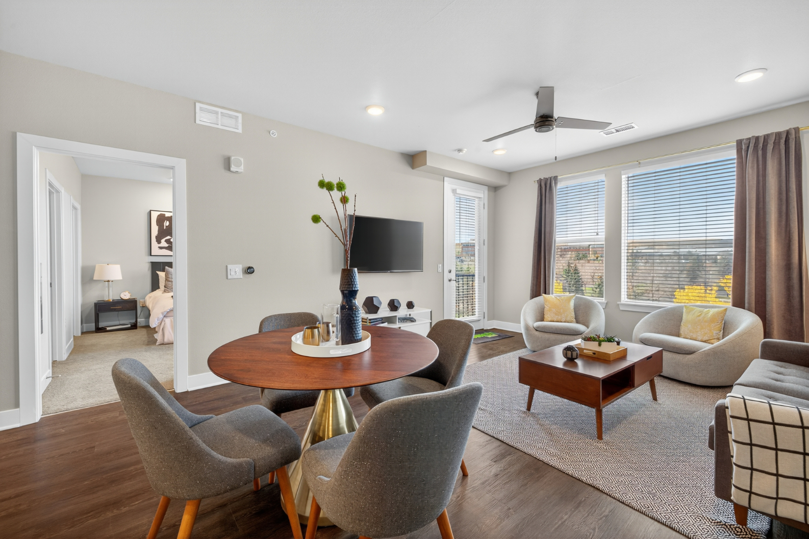 Dining area and Living room with couch and decor