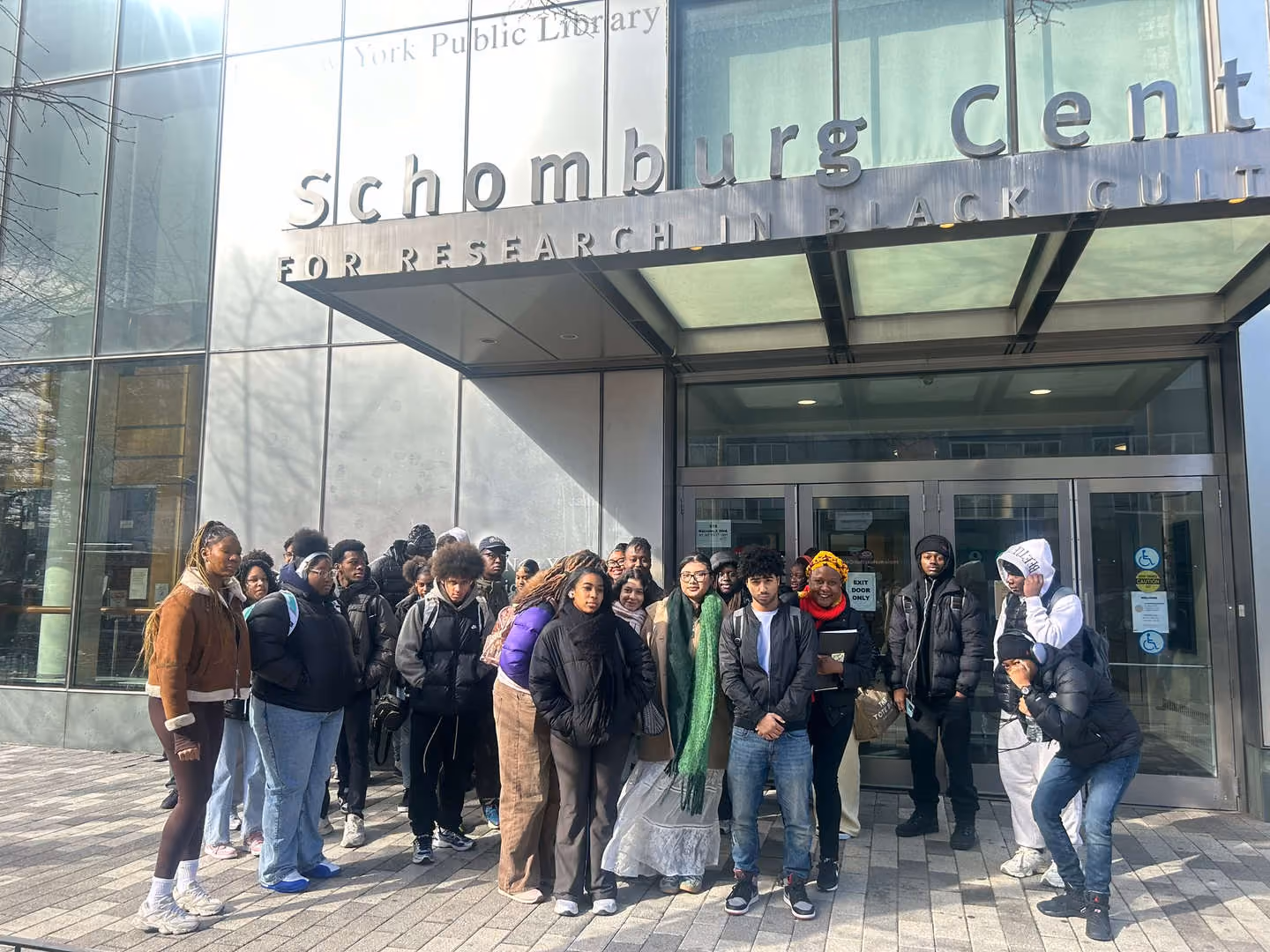 Students gathered outside the Schomburg Center for Research in Black Culture