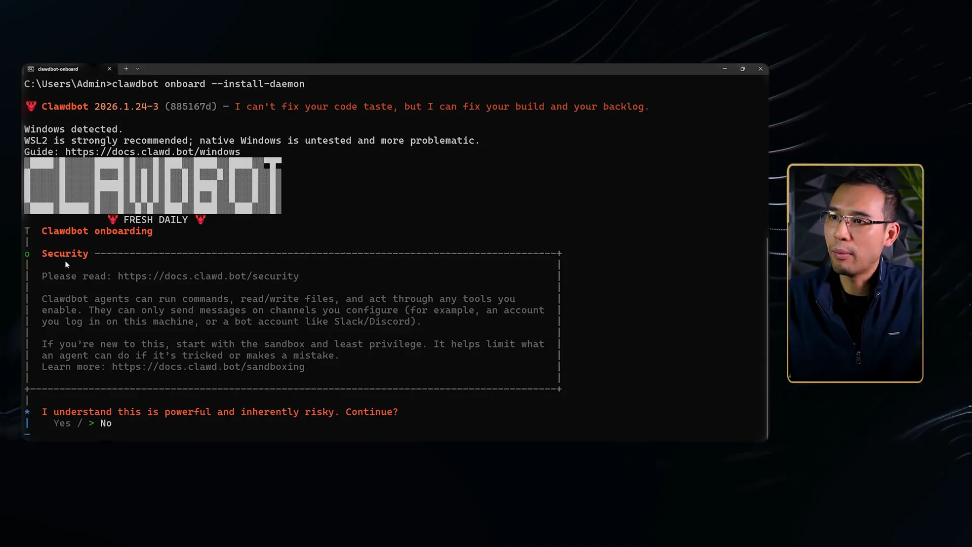 Cửa sổ dòng lệnh chạy clawdbot onboard --install-daemon, in chữ CLAWDBOT cỡ lớn, khối Security khuyên đọc trang tài liệu bảo mật và bắt đầu bằng sandbox cùng least privilege, cuối màn hình hỏi I understand this is powerful and inherently risky Continue với hai lựa chọn Yes hoặc No đang để mặc định là No