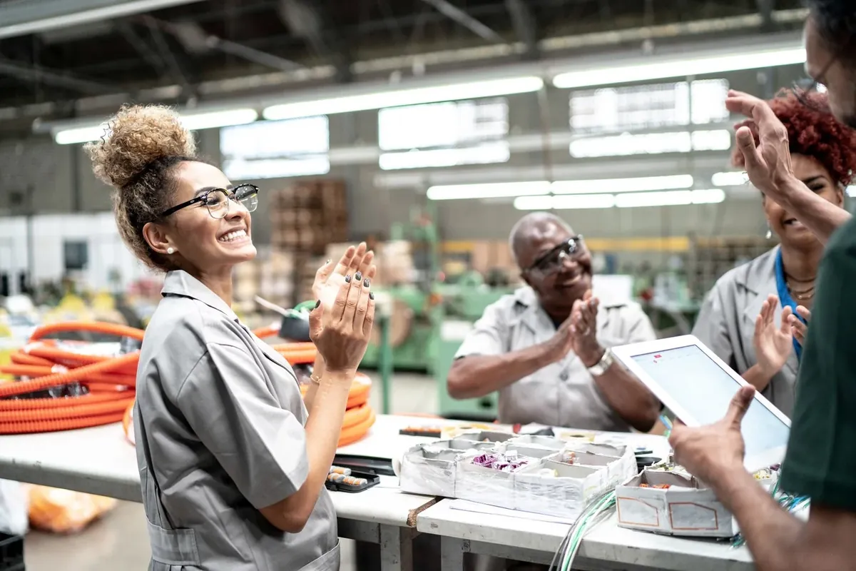Warehouse team reviewing results on a tablet