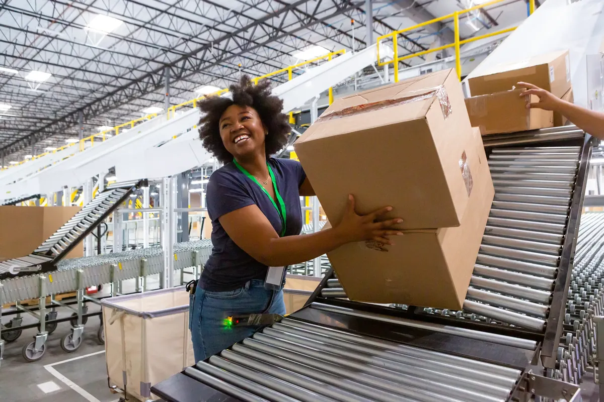 Packages moving down a warehouse conveyor line
