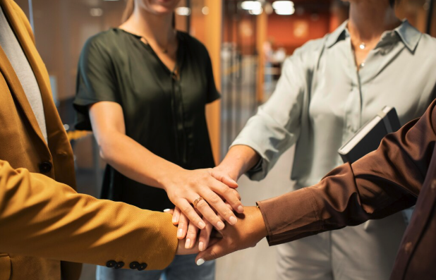 Team joining hands