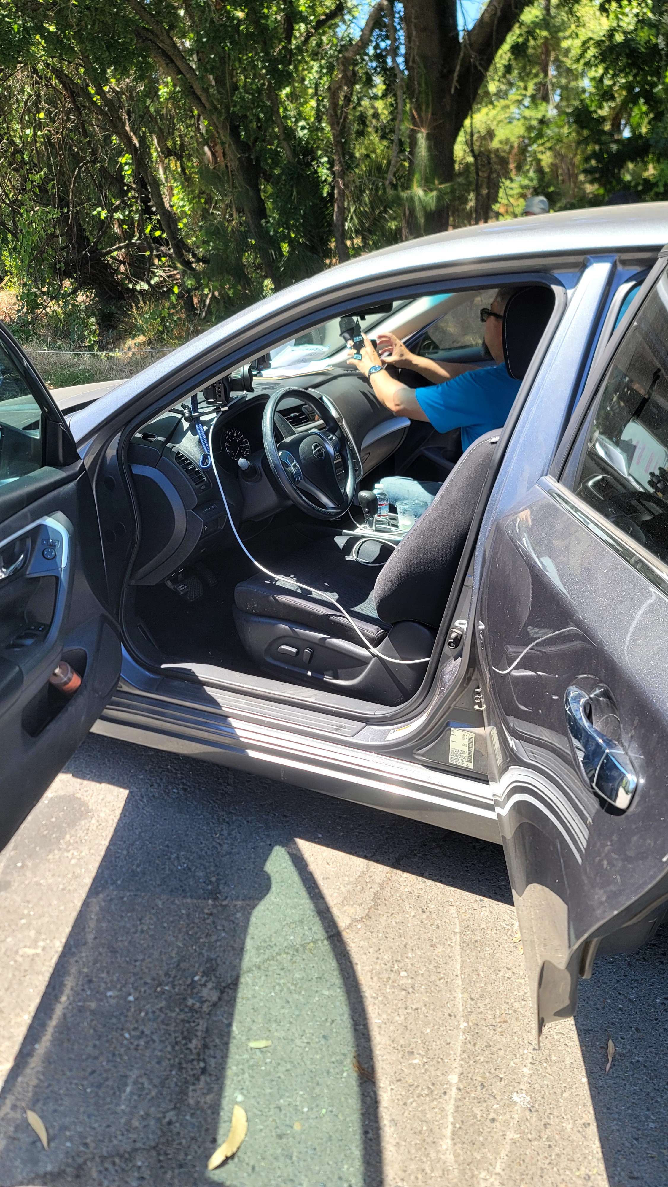 Behind the scenes of It's a Beautiful Day, filming an in-car scene
