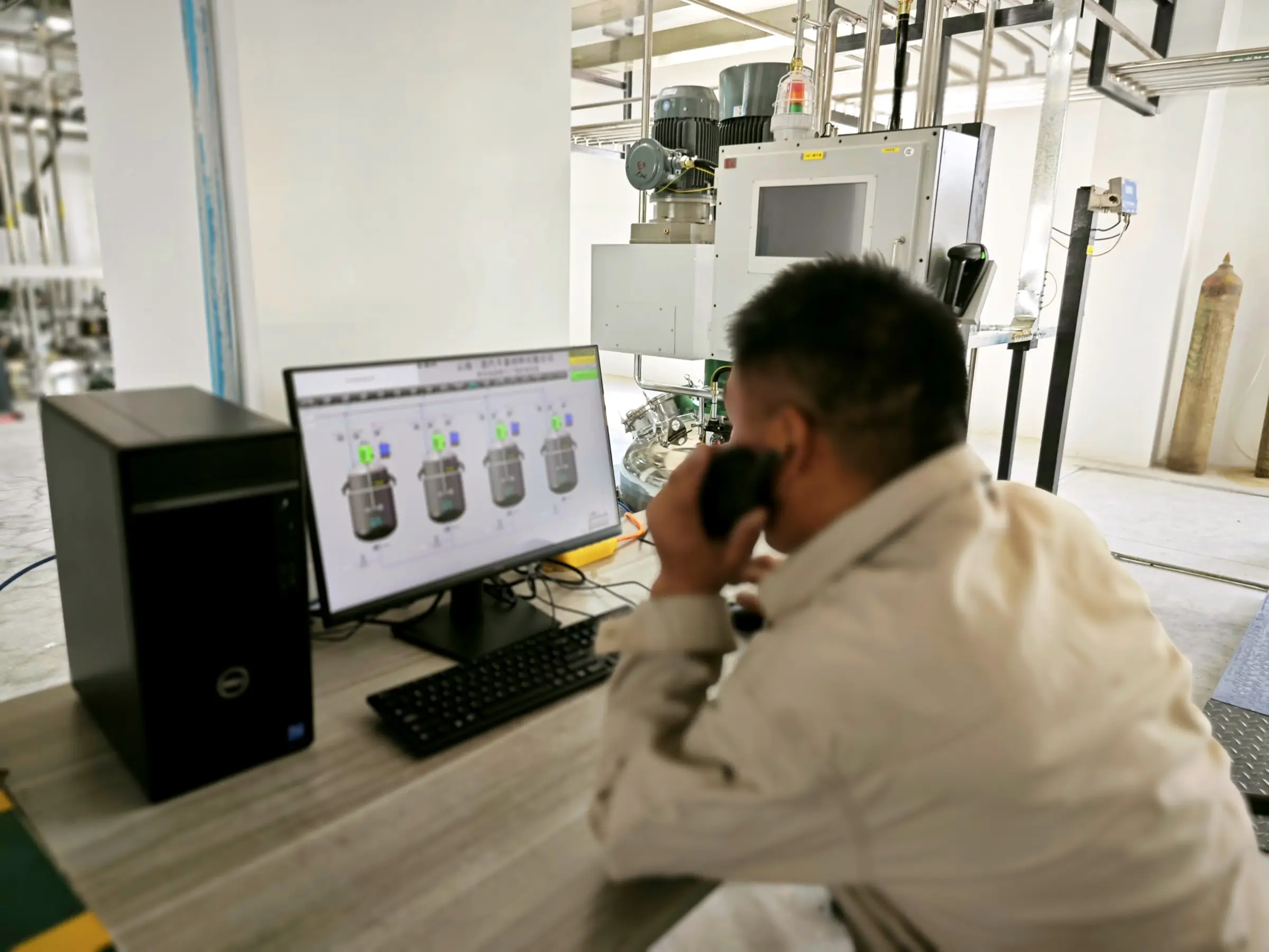 Computer controls on a film coating production line