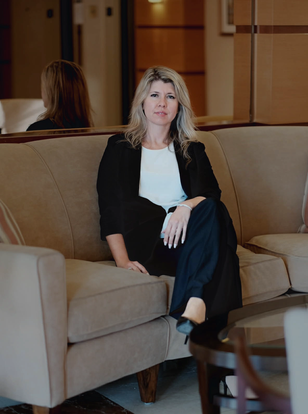 Boyko Law Firm managing attorney, Nataliya Boyko, seated in an office setting