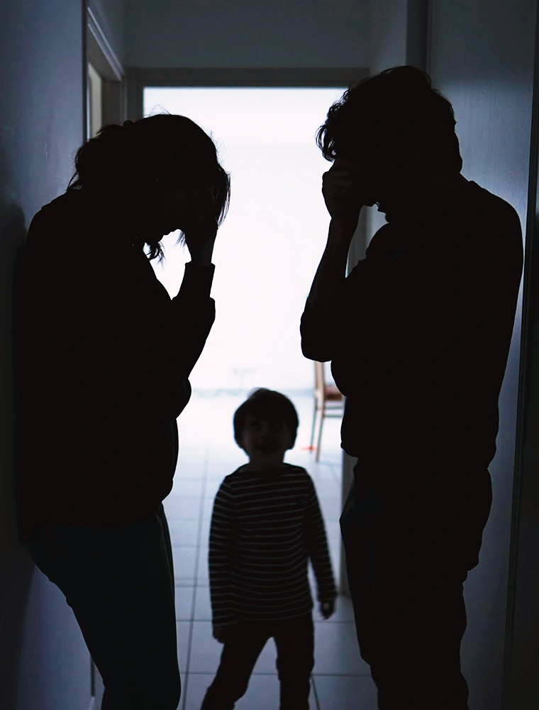 Child caught between parents during a financial dispute over their care, the kind of family conflict a Rego Park child support lawyer may help address
