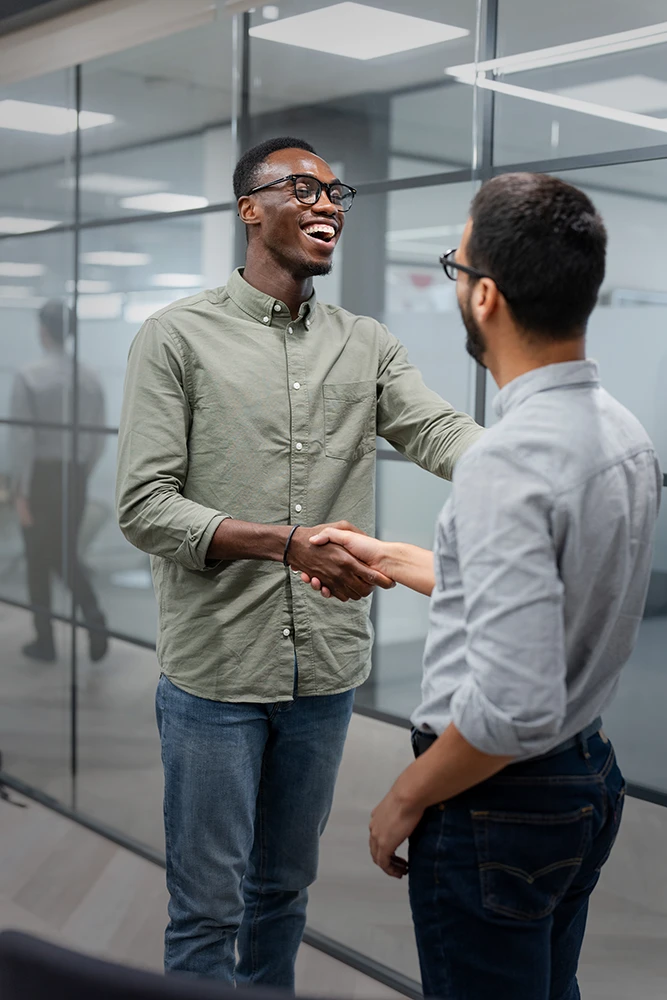 Spouses negotiating financial and property terms with the goal of reaching a fair and manageable resolution before finalizing the divorce with a divorce lawyer in Rego Park