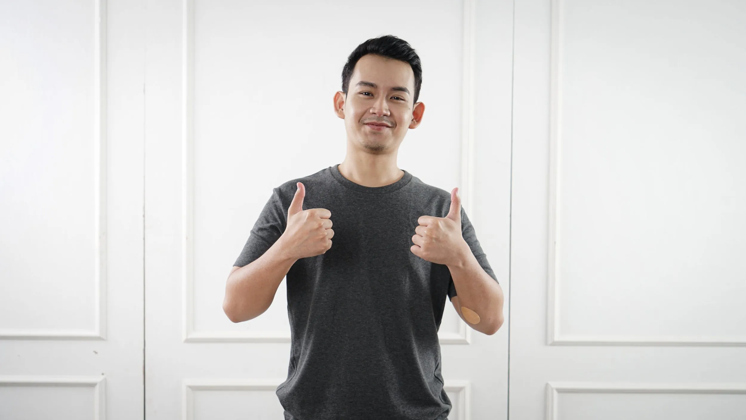 Man holding his thumbs up