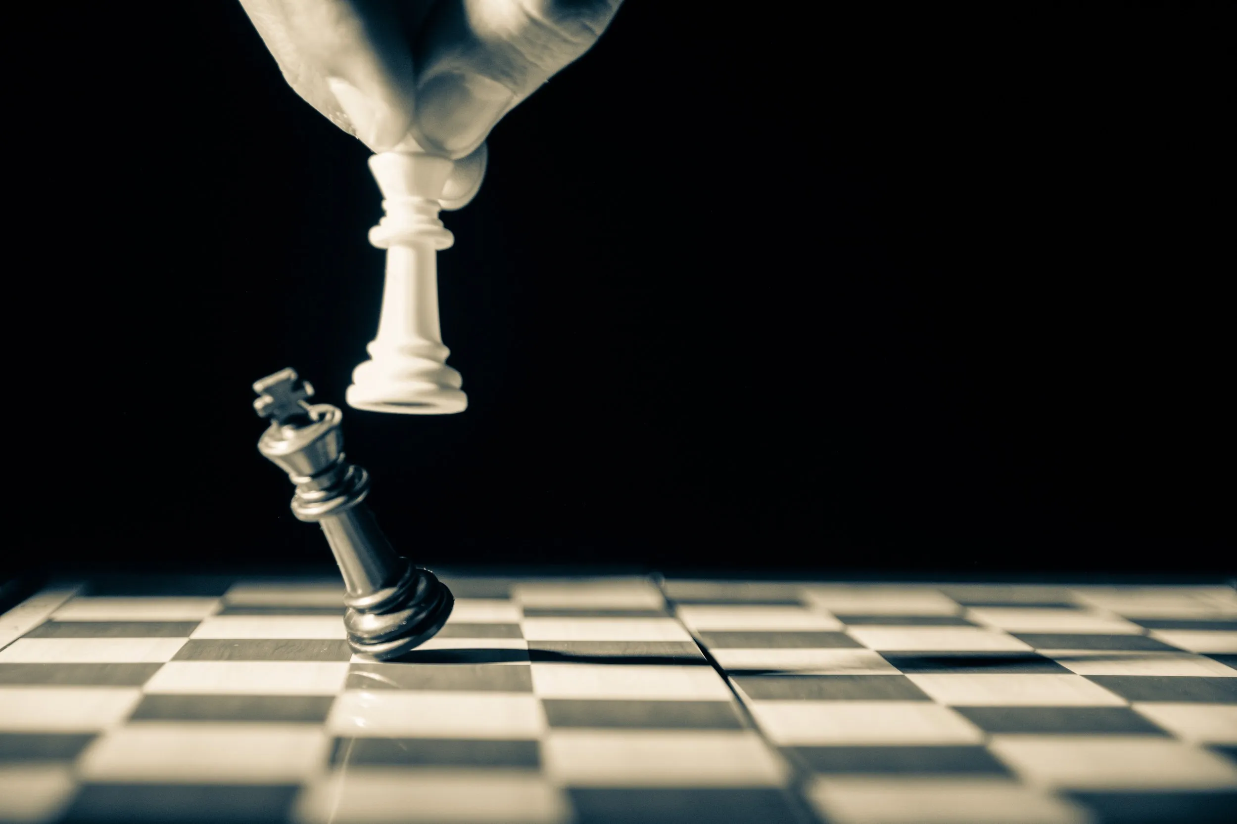 Chess pieces being knocked around