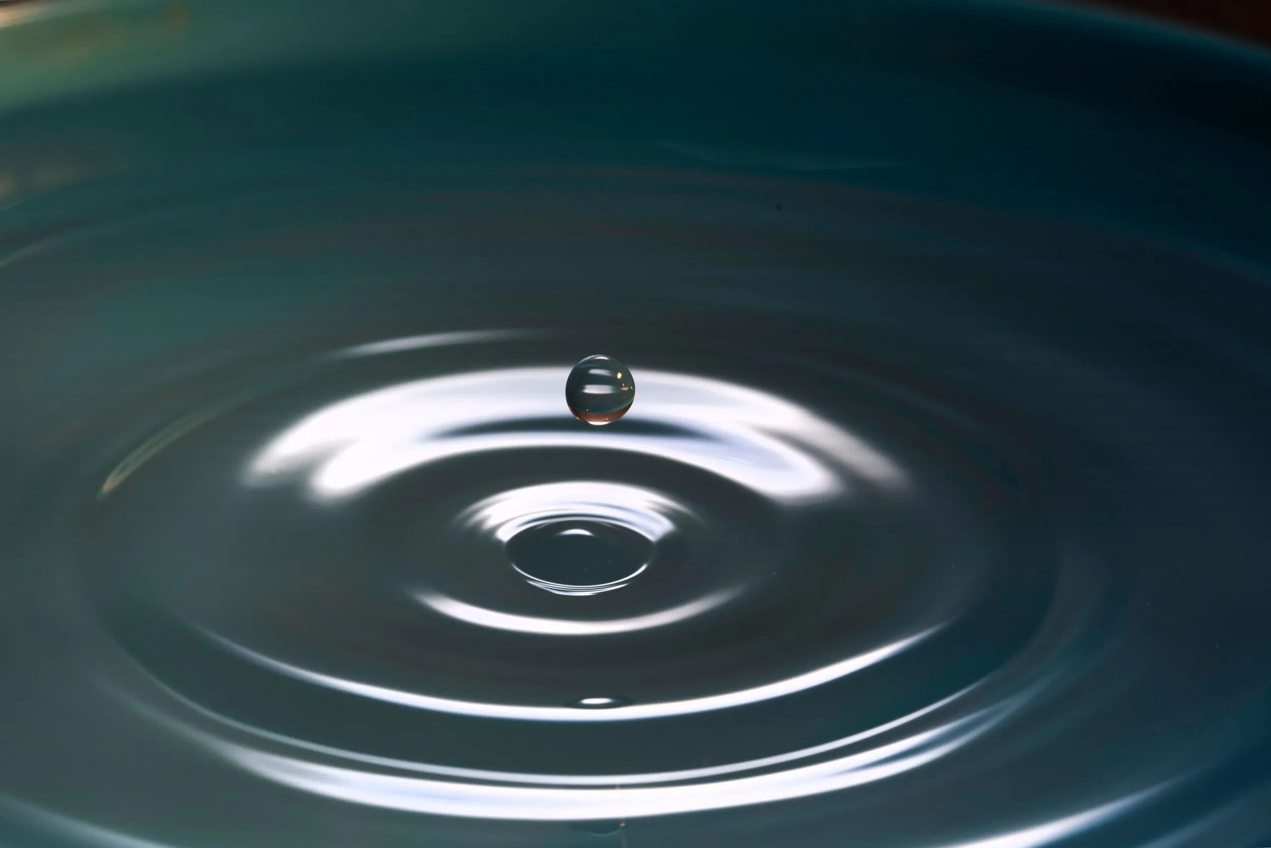 A water droplet about to make impact